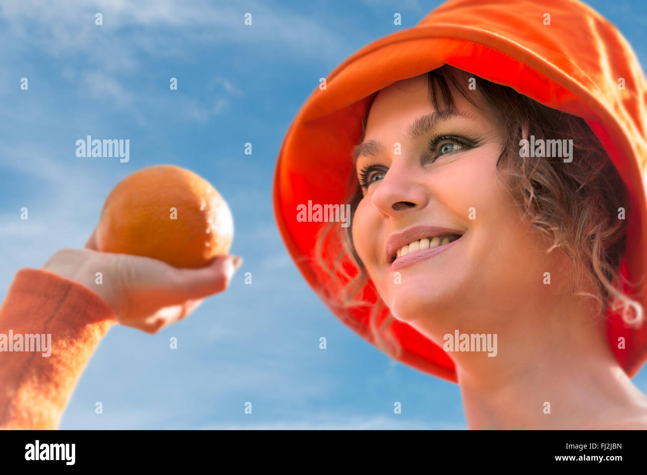 Hat orange hi-res stock photography and images - Alamy
