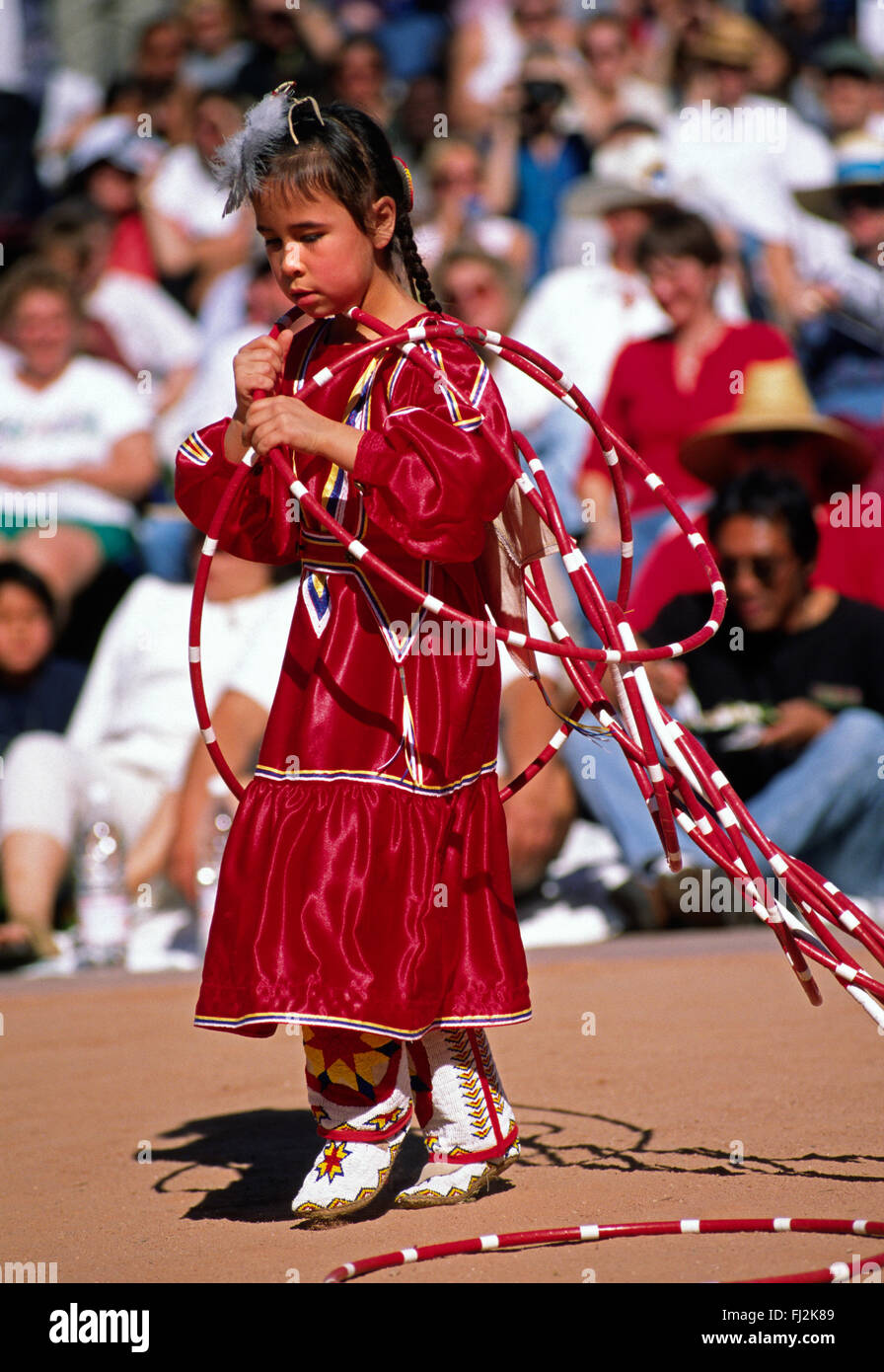 A NATIVE AMERICAN girl competes at the WORLD CHAMPIONSHIP HOOP DANCE CONTEST - PHOENIX, ARIZONA Stock Photo