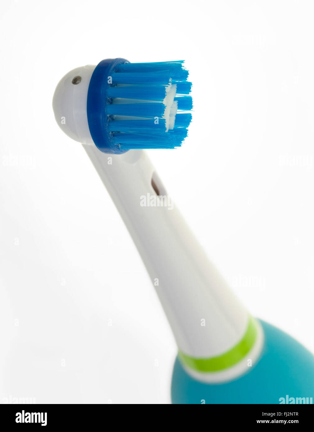 Electric toothbrush isolated on a white background Stock Photo - Alamy