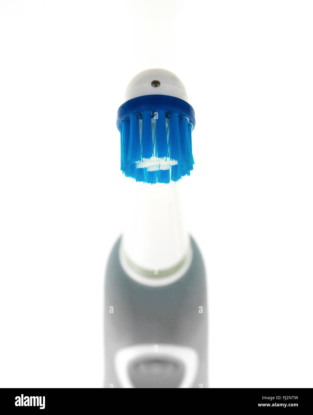 Electric toothbrush isolated on a white background Stock Photo - Alamy