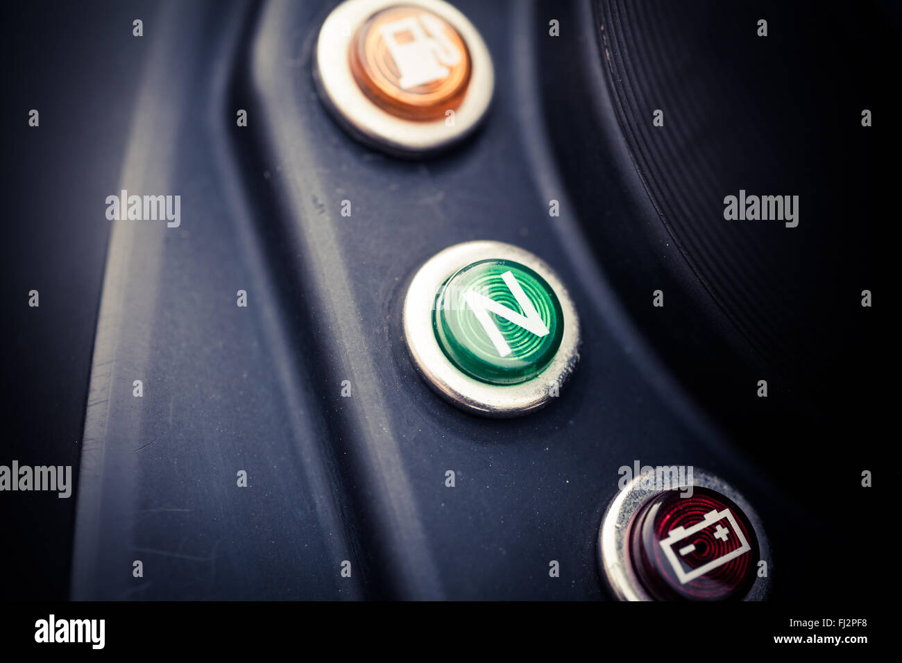 Color close up image of the neutral switch indicator on a motorcycle