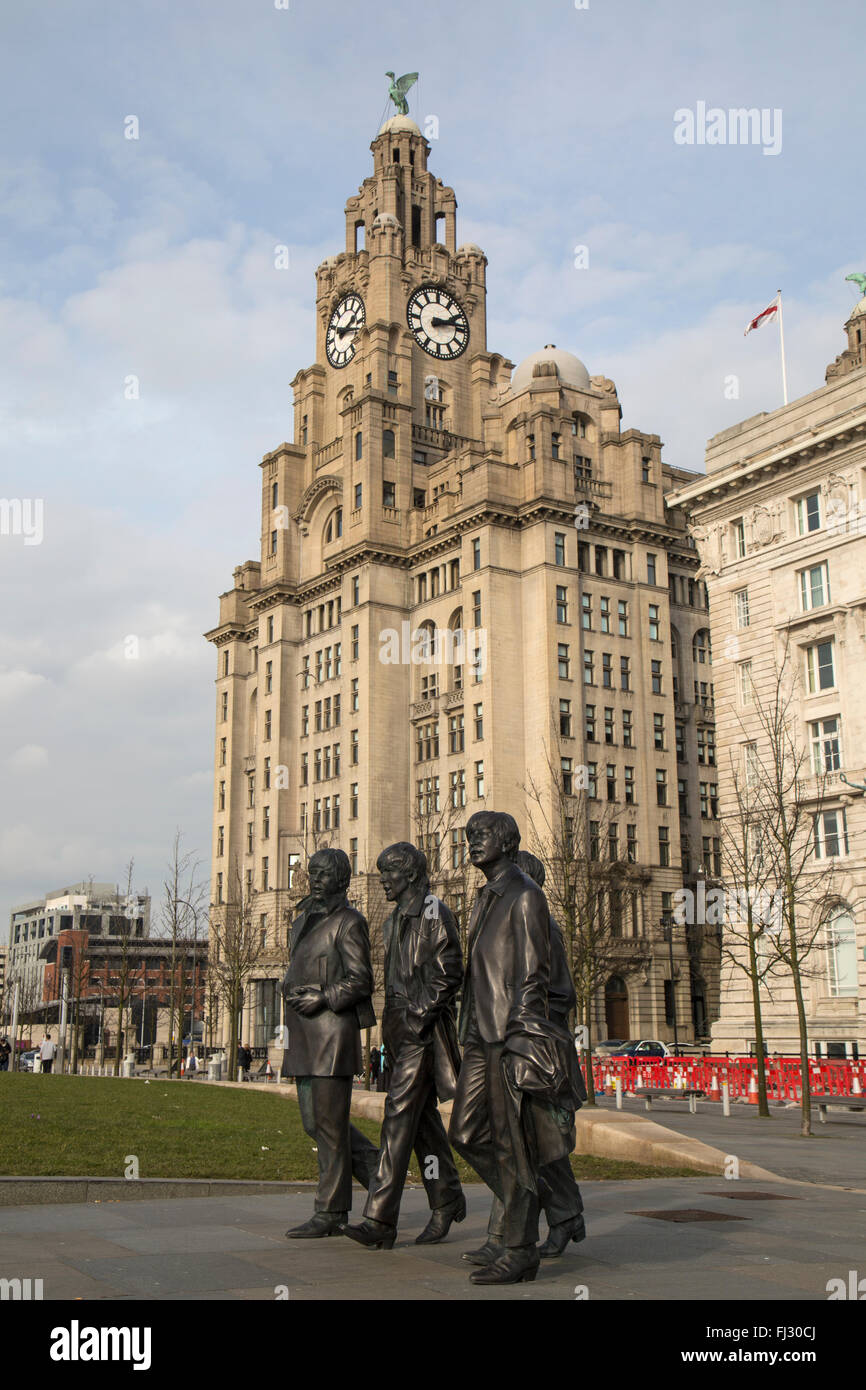 Statue of The Beatles on the Pier Head in Liverpool, with the Royal