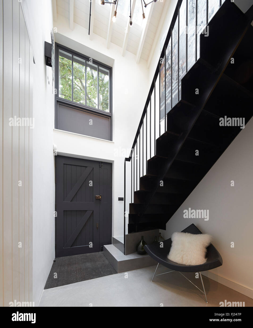 Doubleheight entrance hall and stairway. Orleans Road, Twickenham
