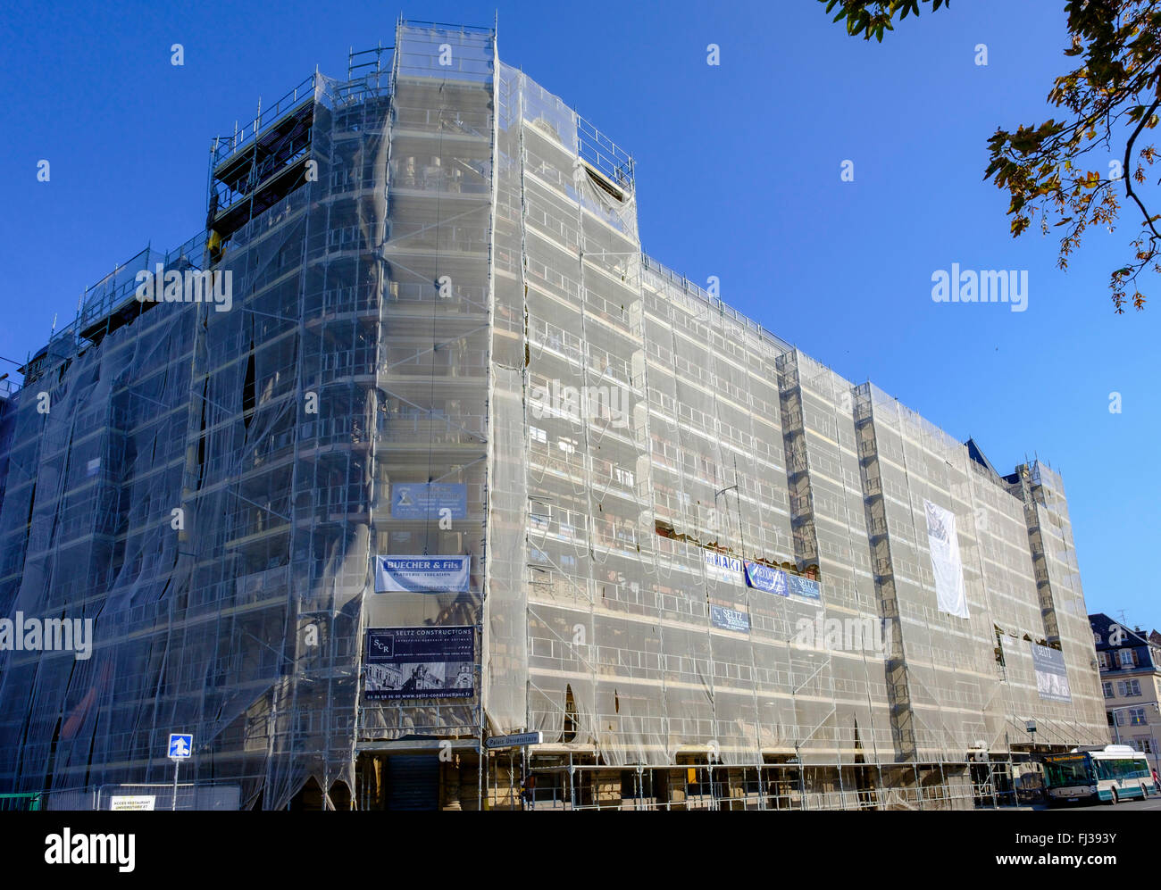 Scaffoldings, safety nets, facelift, Gallia student residence building undergoing renovation, Neustadt district, Strasbourg, Alsace, France, Europe, Stock Photo