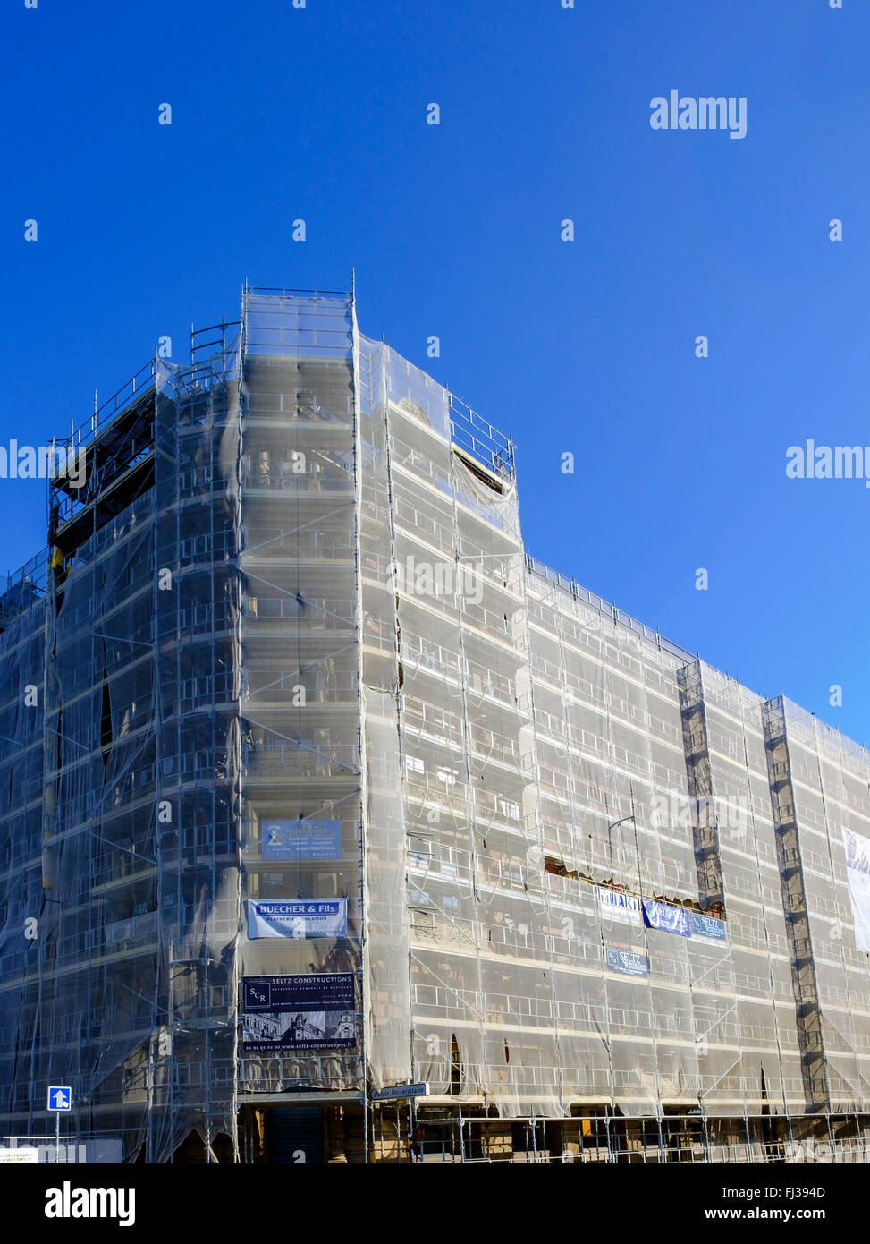 Scaffoldings, safety nets, facelift, Gallia student residence building undergoing renovation, Neustadt district, Strasbourg, Alsace, France, Europe, Stock Photo