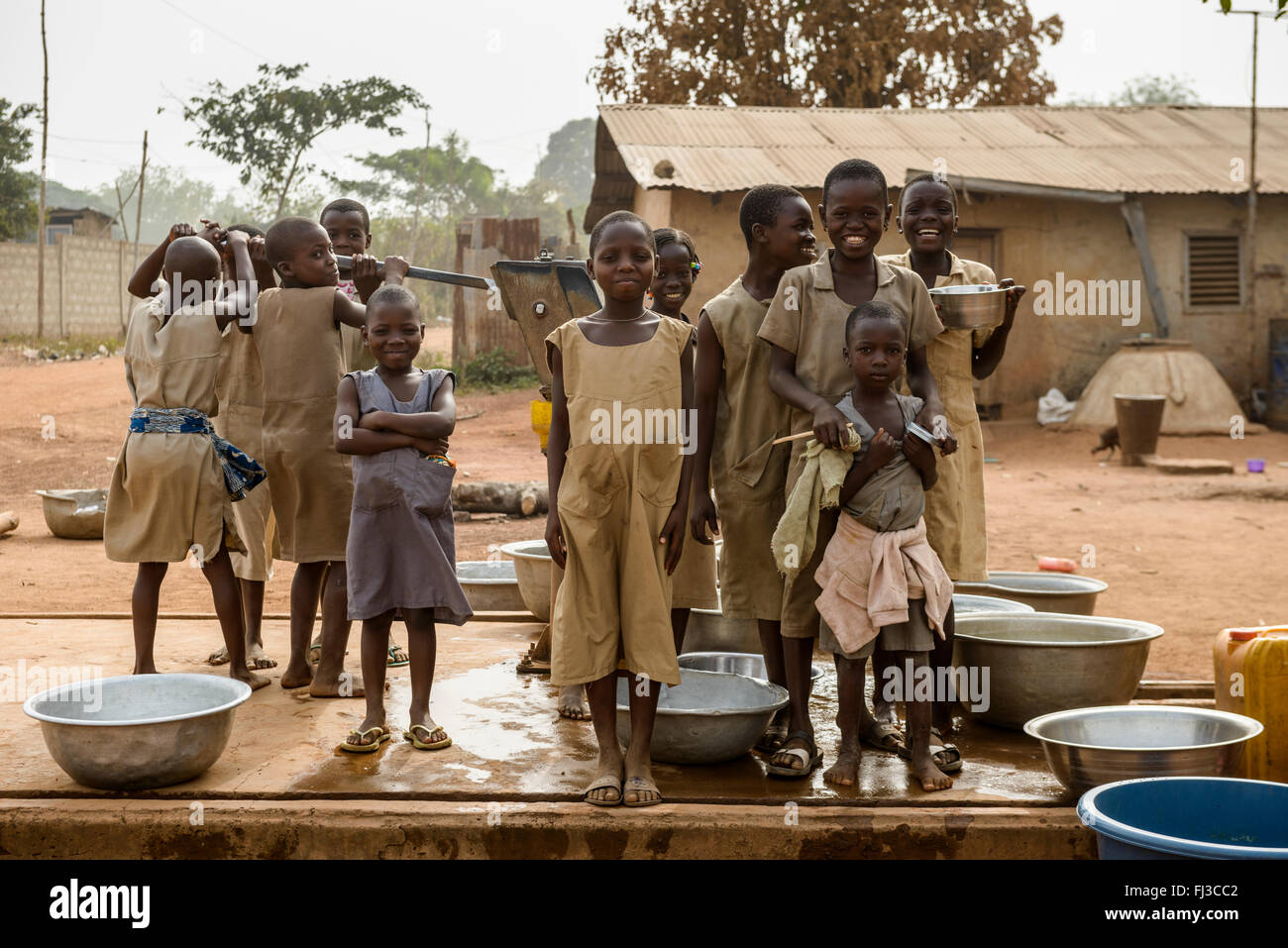 Gathering water in Benin, Africa Stock Photo