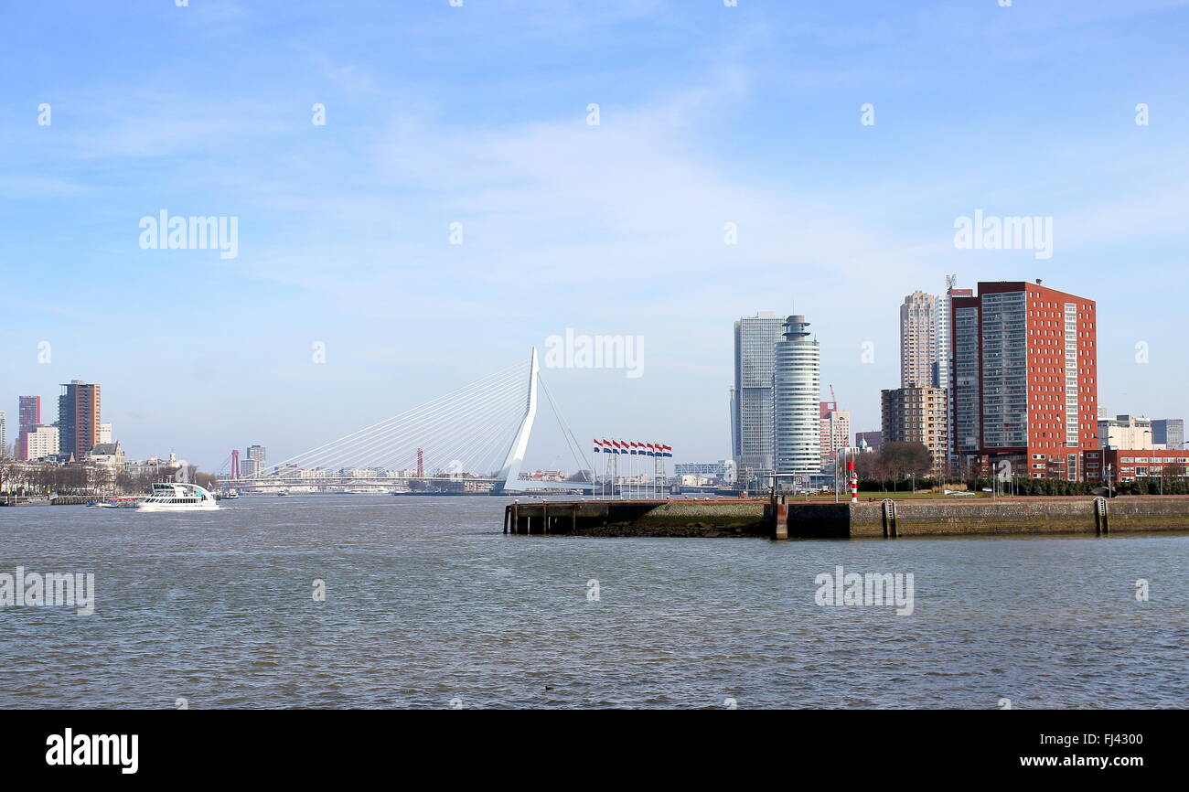 Skyline of Rotterdam, Netherlands. Nieuwe Maas river, Erasmus bridge connecting city centre with Katendrecht peninsula to south Stock Photo