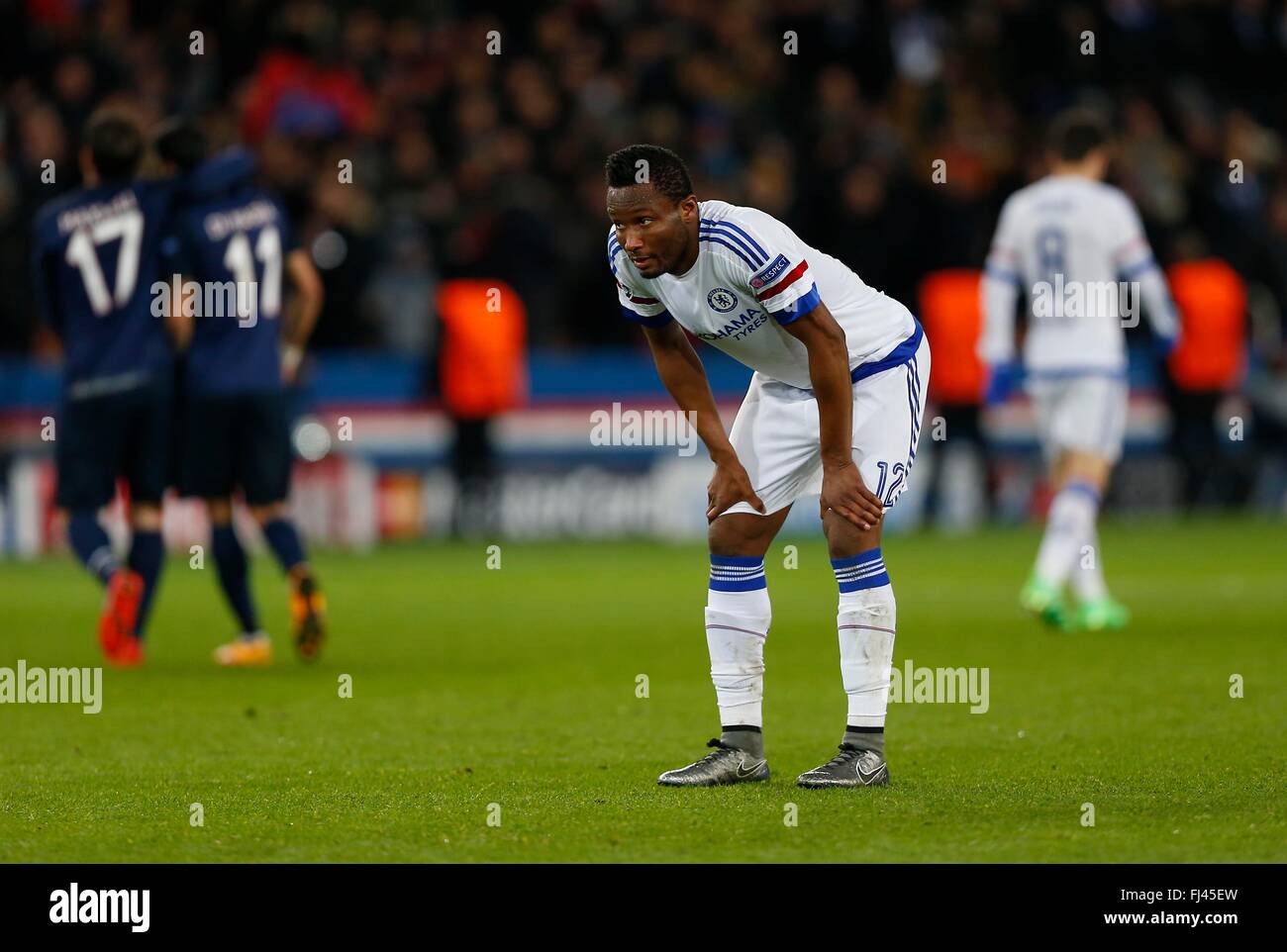 Chelsea’s Mikel John Obi looks dejected after Edinson Cavani's goal during the UEFA Champions League round of 16 match between Paris Saint-Germain and Chelsea at the Parc des Princes Stadium in Paris. February 16, 2016. James Boardman / Telephoto Images +44 7967 642437 Stock Photo
