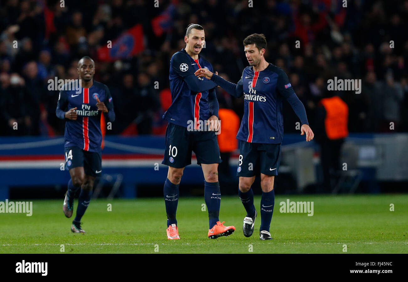 Zlatan Ibrahimovic of PSG (L) celebrates after scoring the opening goal with Thiago Motta of PSG during the UEFA Champions League round of 16 match between Paris Saint-Germain and Chelsea at the Parc des Princes Stadium in Paris. February 16, 2016. James Boardman / Telephoto Images +44 7967 642437 Stock Photo