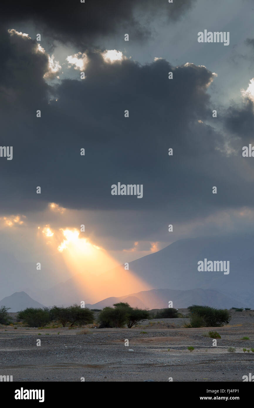 Sunrise near Nakhl, cloudy sunrise in the omani desert, Nakhl, Al Batinah, Oman Stock Photo
