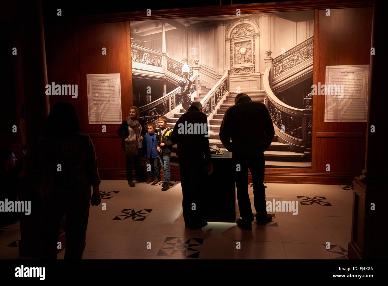 A visitor looks at authentic objects from the Titanic at the exhibition Titanic: The Artifact Exhibition  Prague Czech Republic Stock Photo