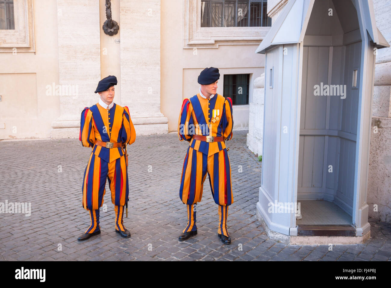 Swiss guards on duty at St. Peter's Basilica - Vatican City Stock Photo ...