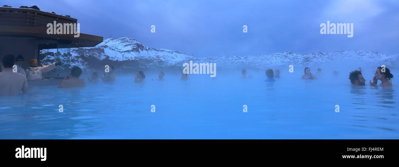 People in the Blue Lagoon, a geothermal spa and one of the most popular attractions in Iceland, near Grindavík village Reykjanes Stock Photo