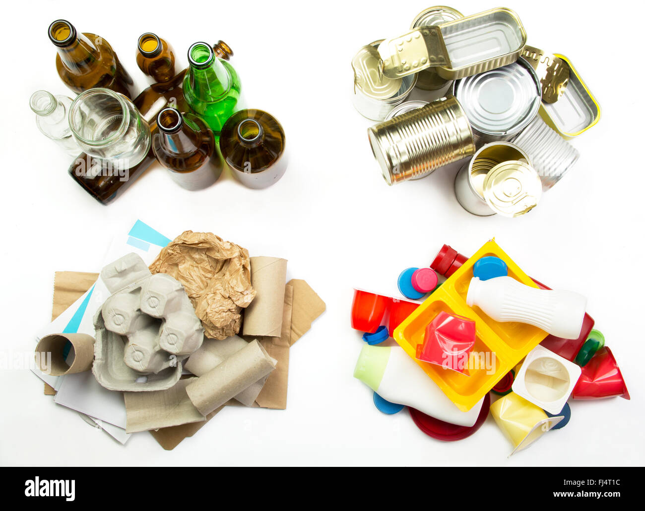 Segregated garbage - glass, metal, paper and plastic Stock Photo