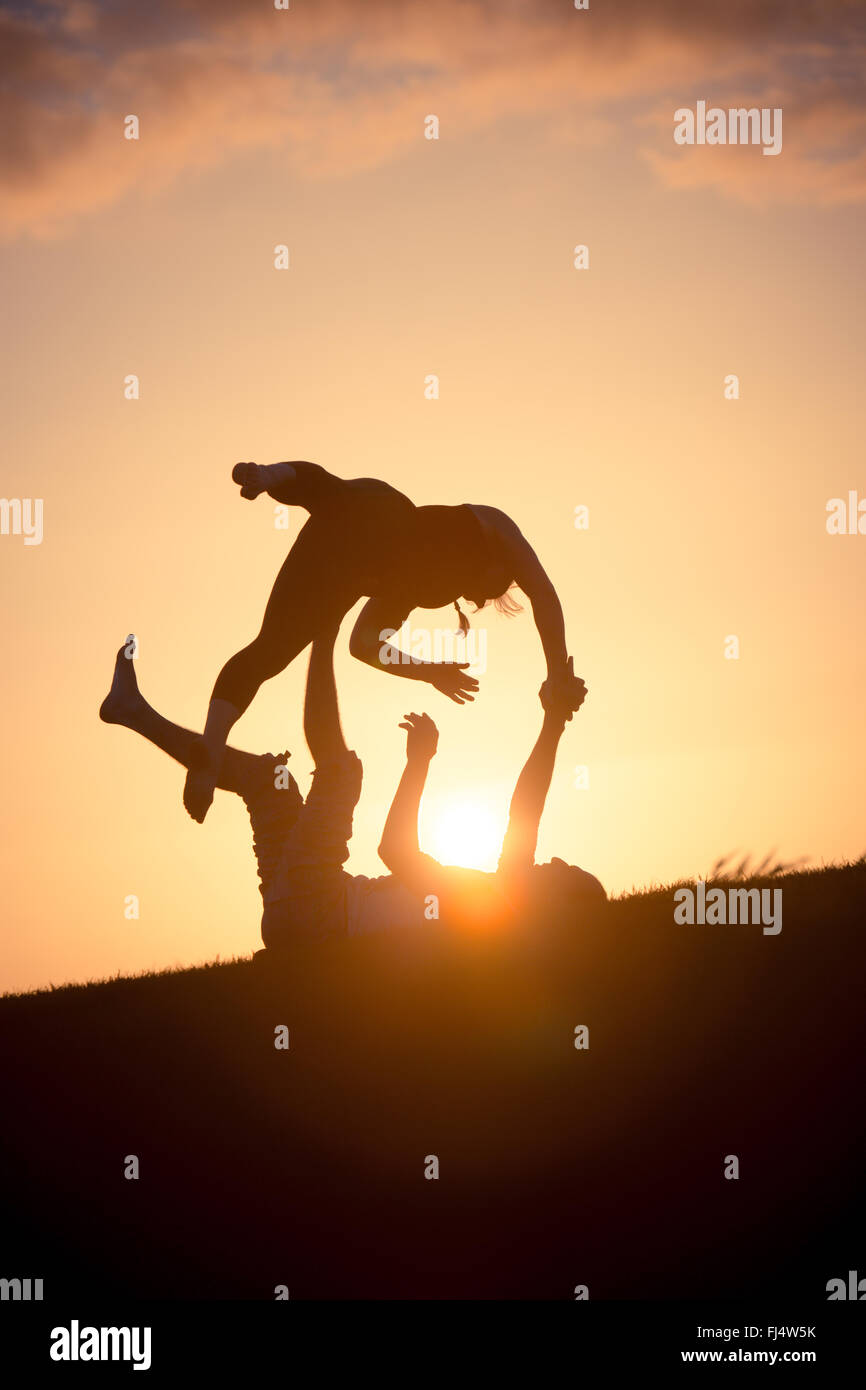 Yoga by the sunset hi-res stock photography and images - Alamy