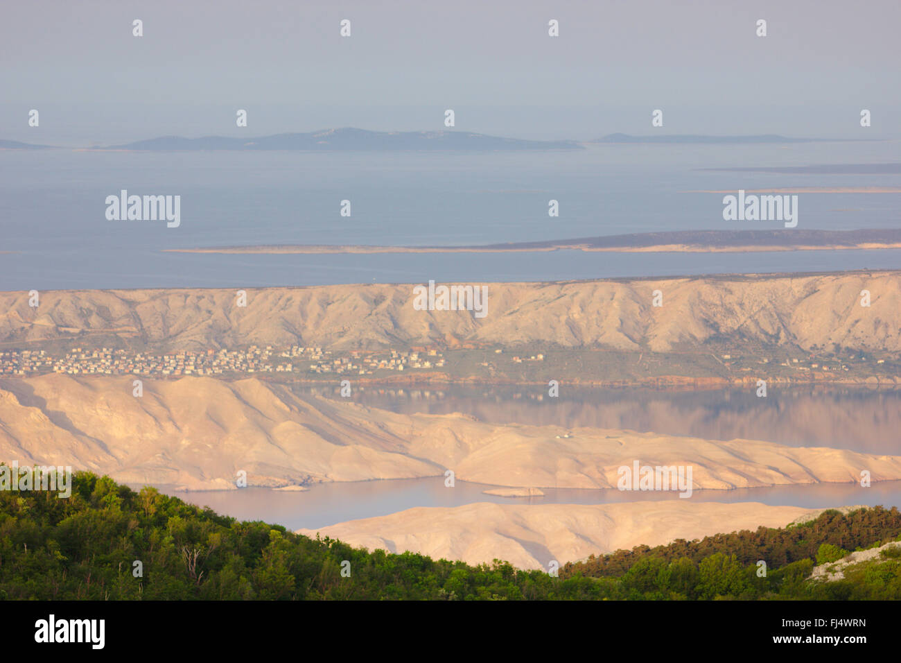 view from Velebit mountain range to the Adriatic Sea with Pag island in morning light, Croatia, Pag Stock Photo