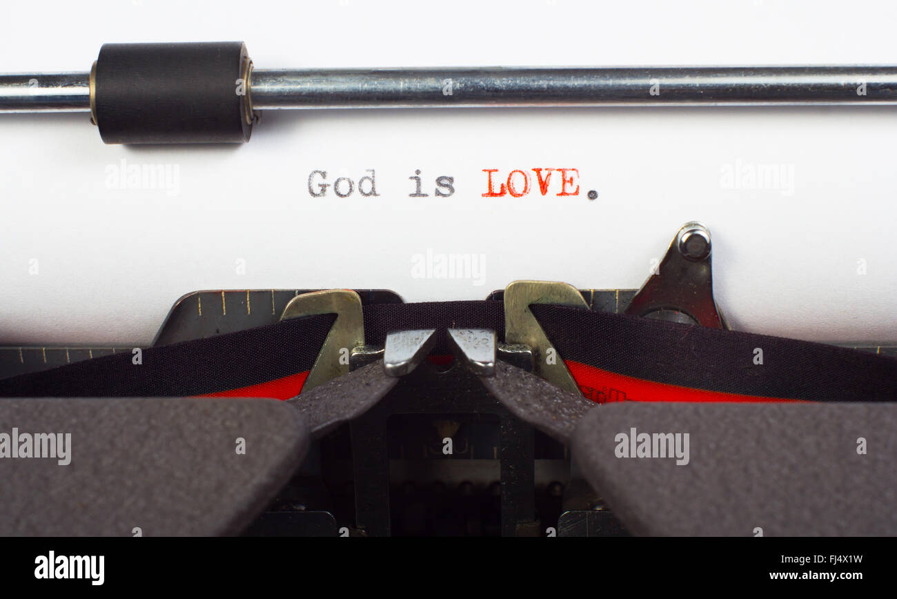 'God is love' written on typewriter Stock Photo
