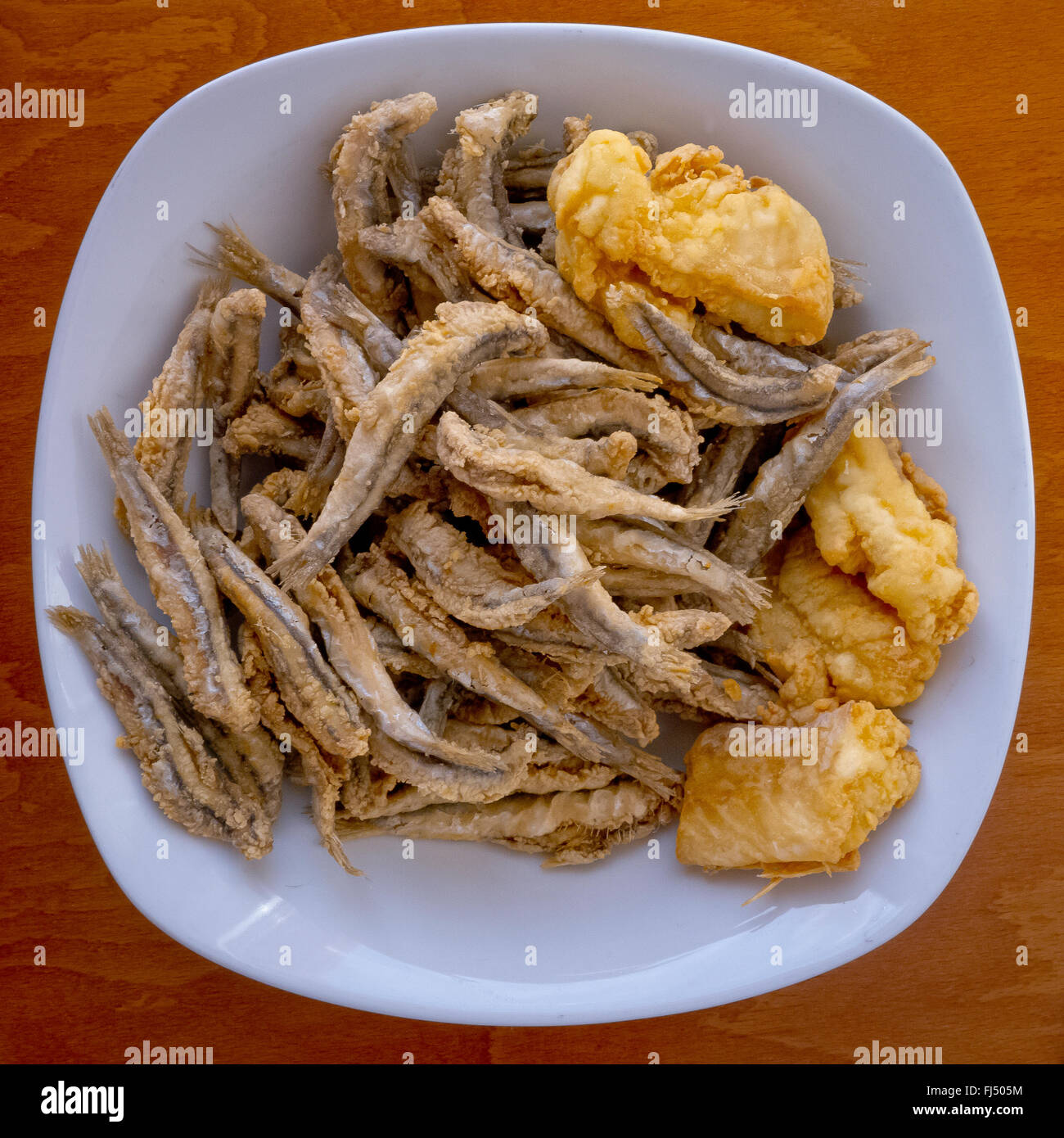 Mixed fried fishes. Stock Photo