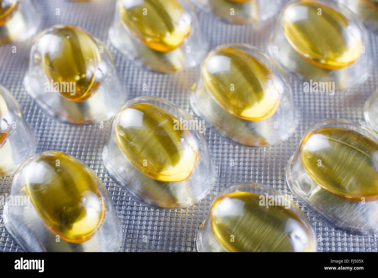 Cod Liver Oil Capsules, Omega 3, Vitamin D blister packed Stock Photo