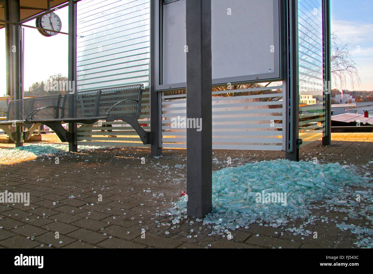 pieces of broken glass at a train platform, vandalism, Germany Stock Photo