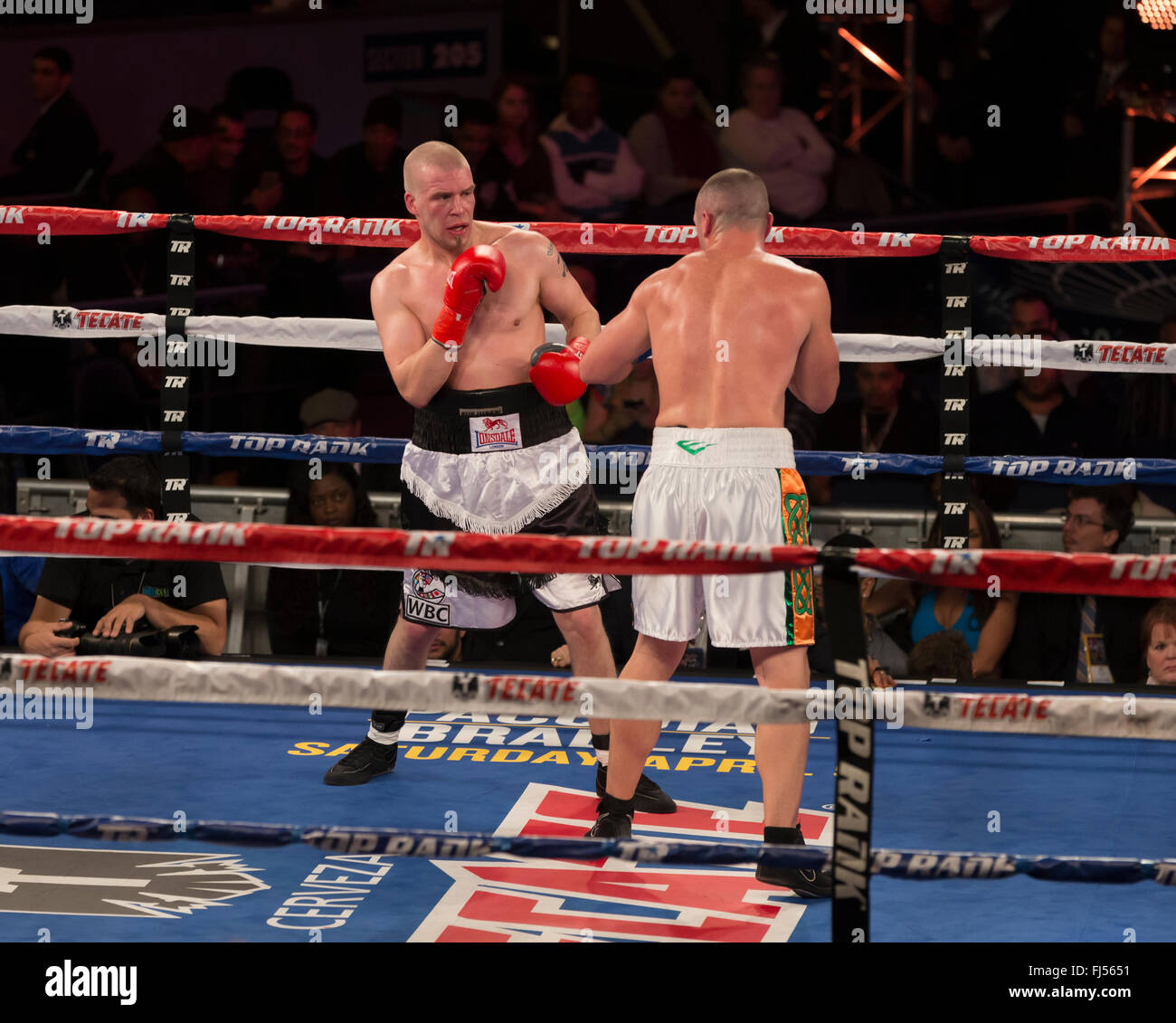 New York, NY USA - February 27, 2016: Sean Monaghan (white trunks) fights Janne Forsman of Finland in professional boxing match in Light Heavyweight category at Madison Square Garden Stock Photo