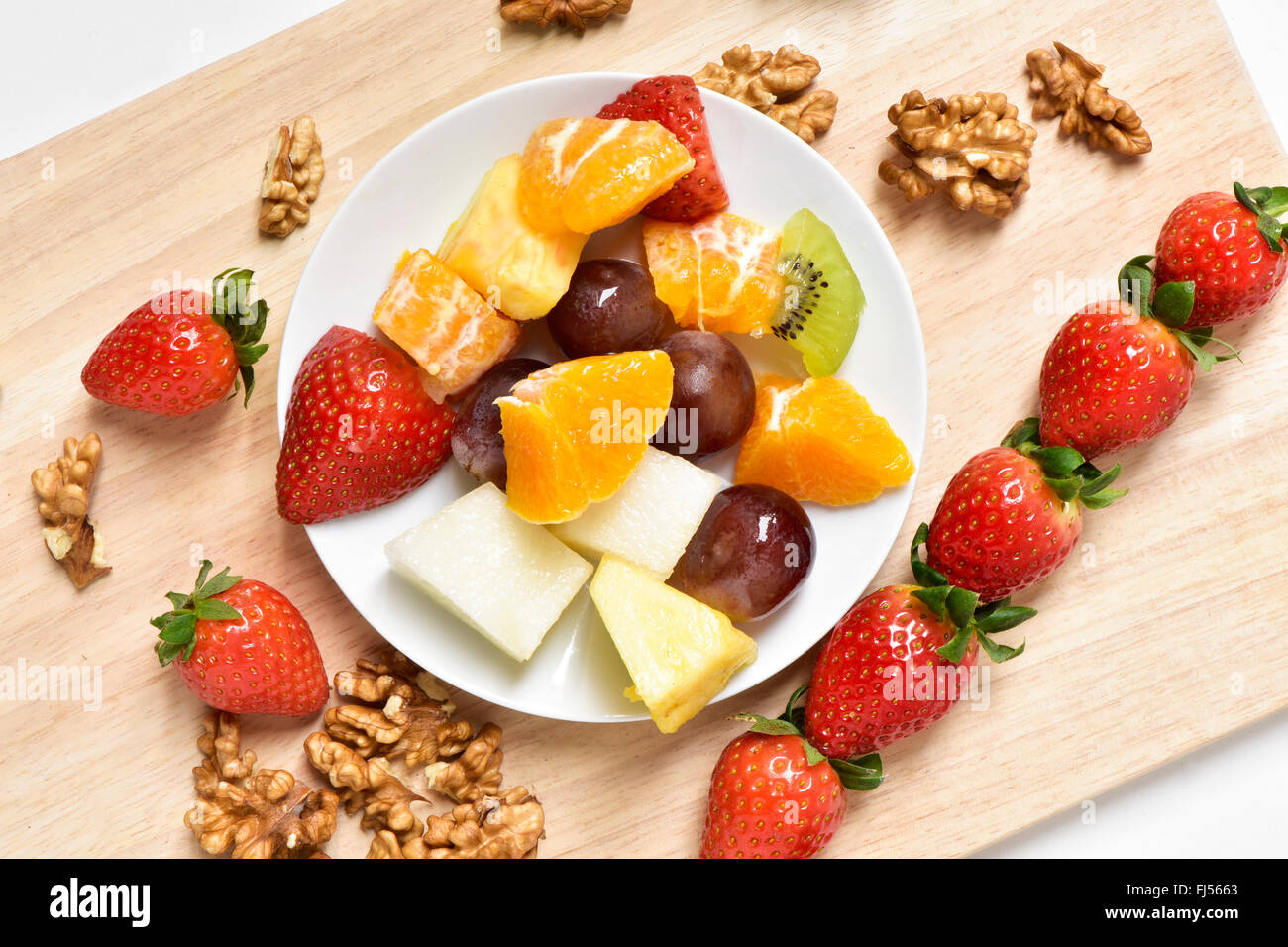 Melon pineapple fruit salad hi-res stock photography and images - Alamy