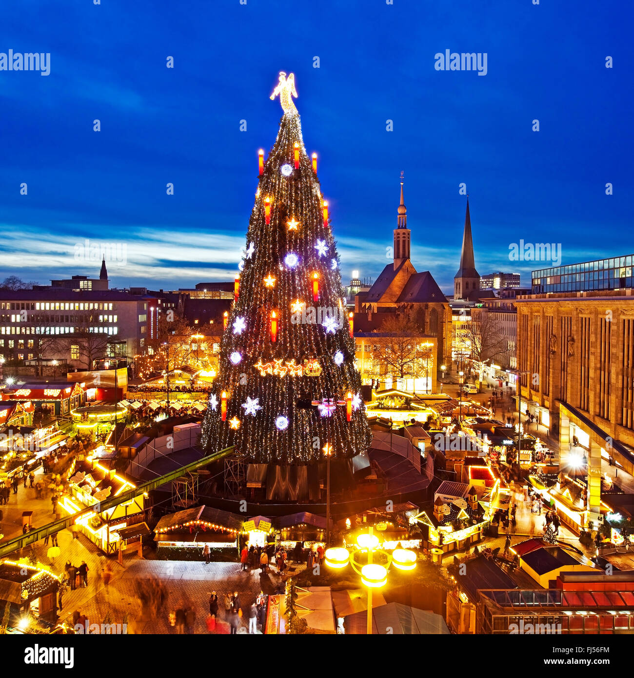 Christmas market with gigantic Christmas tree on Hansaplatz, Germany, North Rhine-Westphalia, Ruhr Area, Dortmund Stock Photo