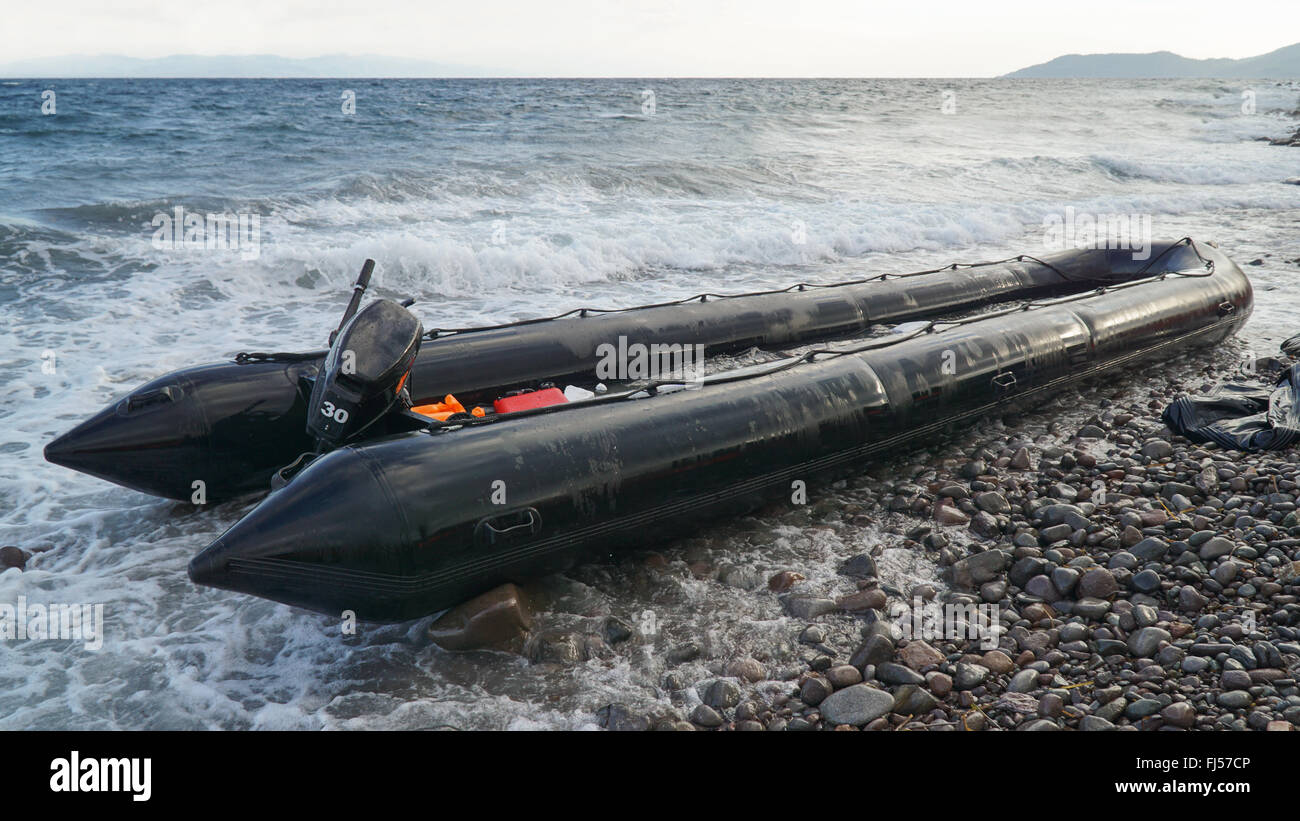 LESVOS, GREECE - October 13, 2015: The empty rubber dinghy of refugees arrived from Turkey Stock Photo