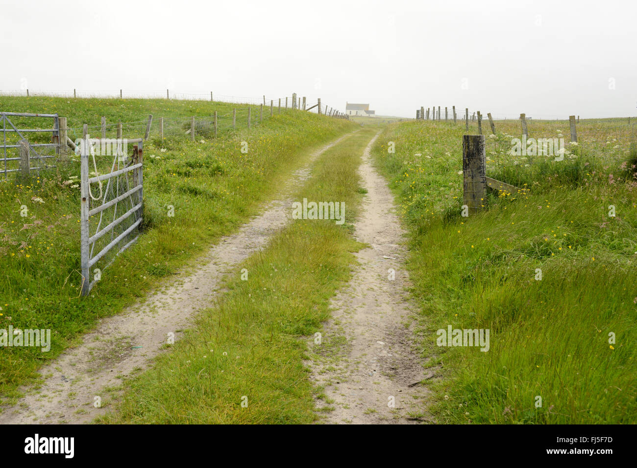 Farm track on a grey day in Askernish, South Uist, Outer Hebrides, Scotland Stock Photo