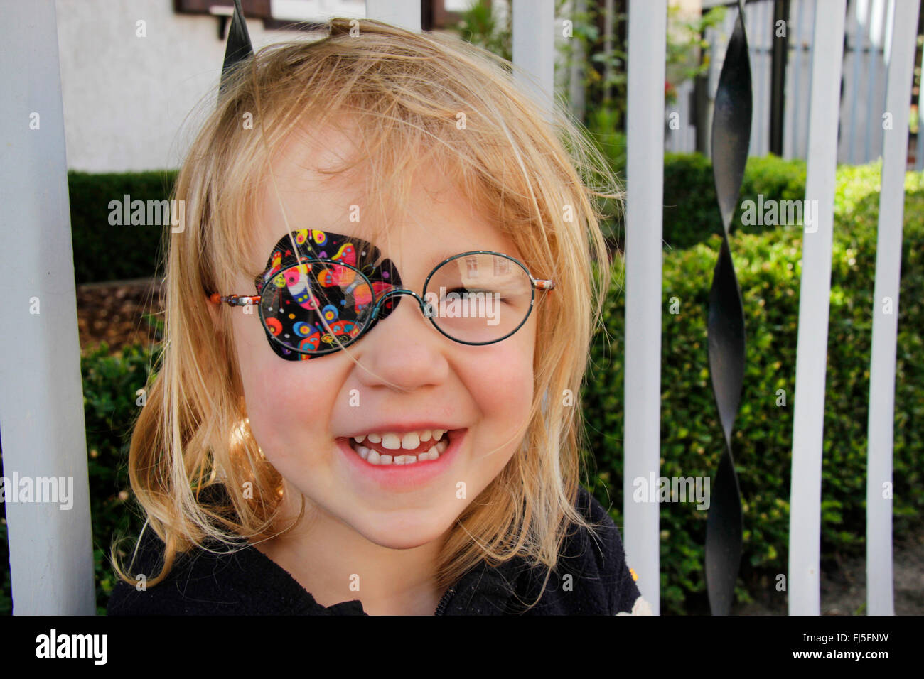 little girl with eyepatch, portrait of a child Stock Photo