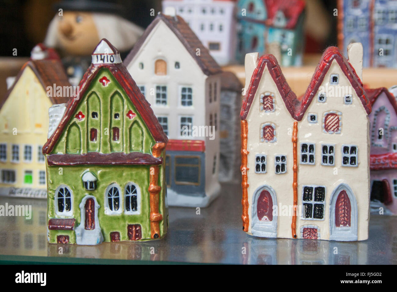 Ceramic models of medieval merchant's houses in a souvenir shop window, Tallinn, Estonia Stock Photo