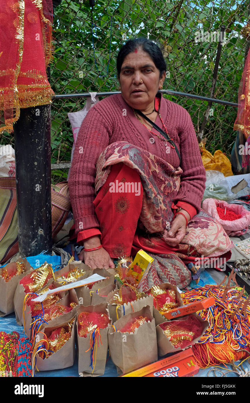 Senior Indian woman selling tourist trinkets, Darjeeling, West Bengal, India. Stock Photo