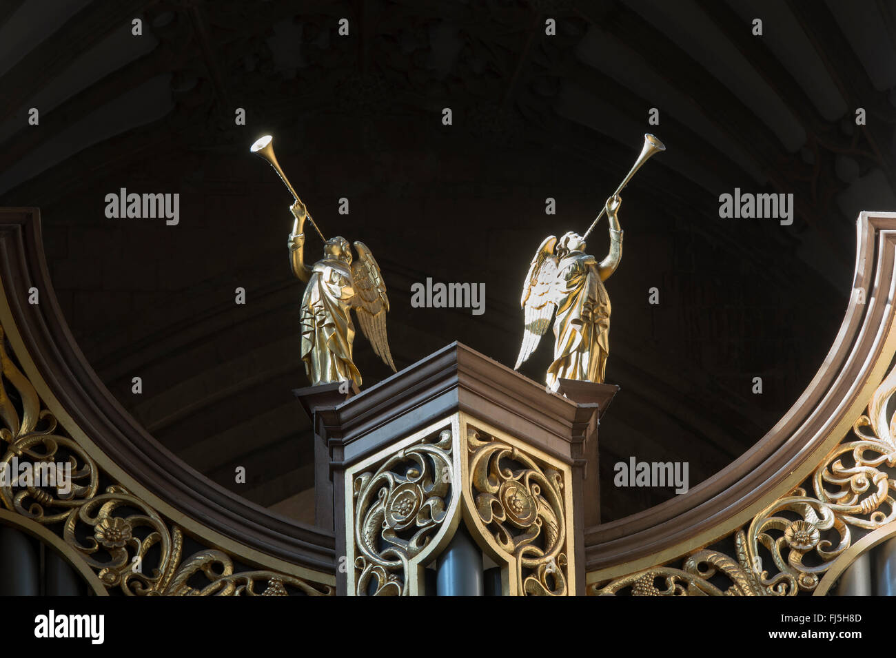 Trumpeting angel statues on top of the organ in Wells Cathedral, Somerset, England Stock Photo