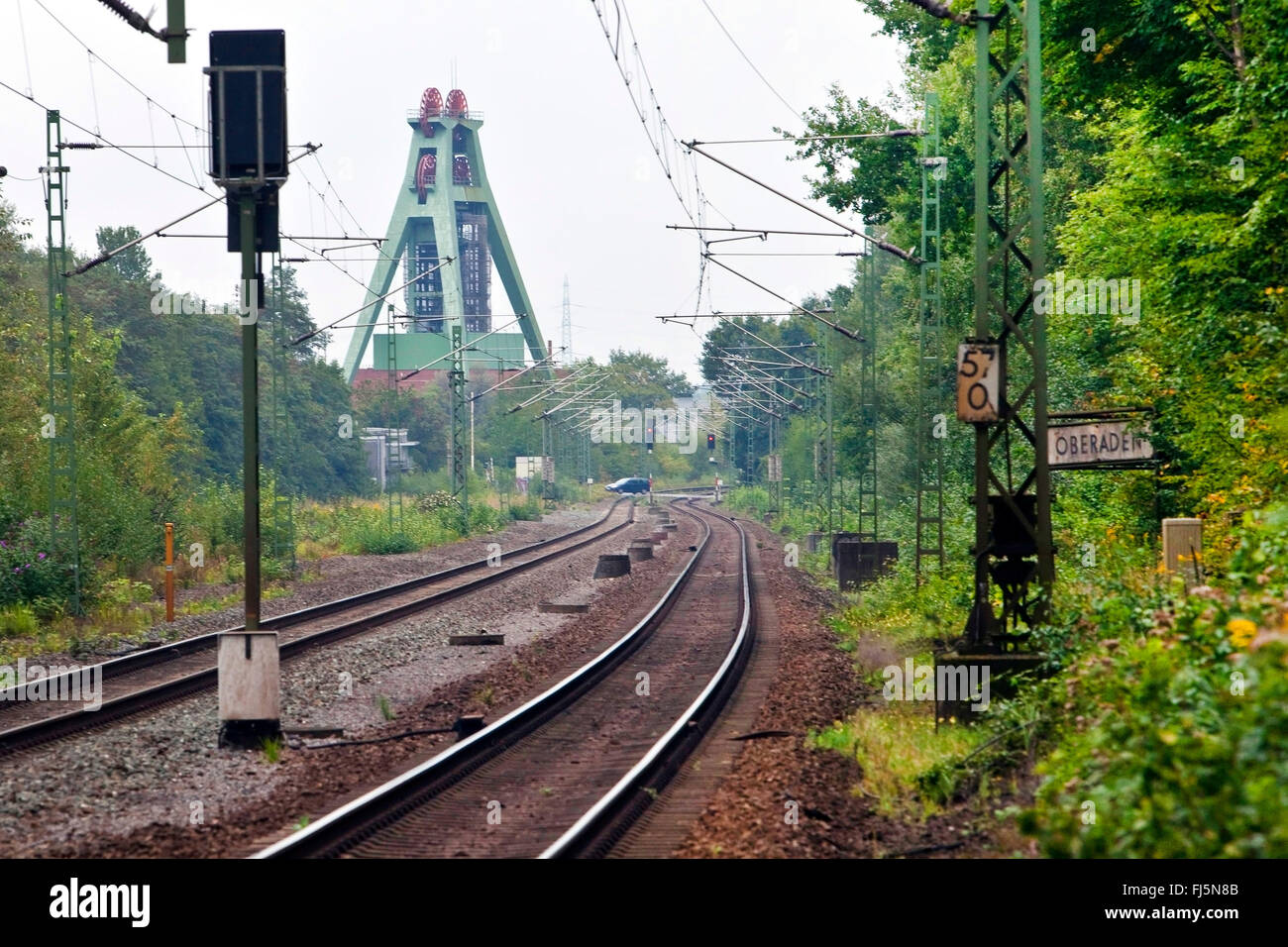 railway tracks and headframe of coal pit Haus Aden, Germany, North Rhine-Westphalia, Ruhr Area, Bergkamen Stock Photo