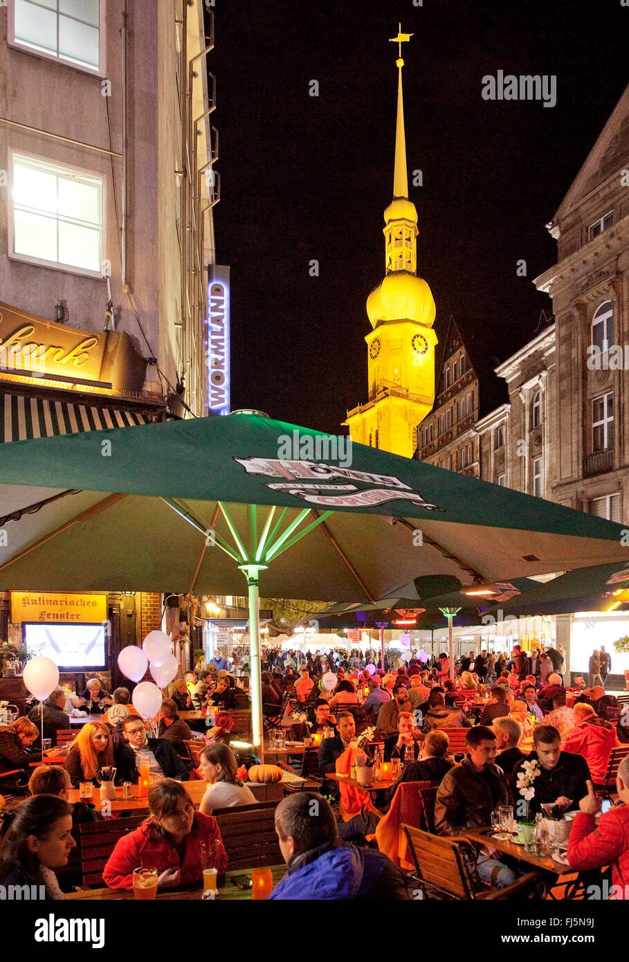 People in a sidewalk restaurant at the old market with Reinoldi church in Dortmund, Germany, North Rhine-Westphalia, Ruhr Area, Dortmund Stock Photo