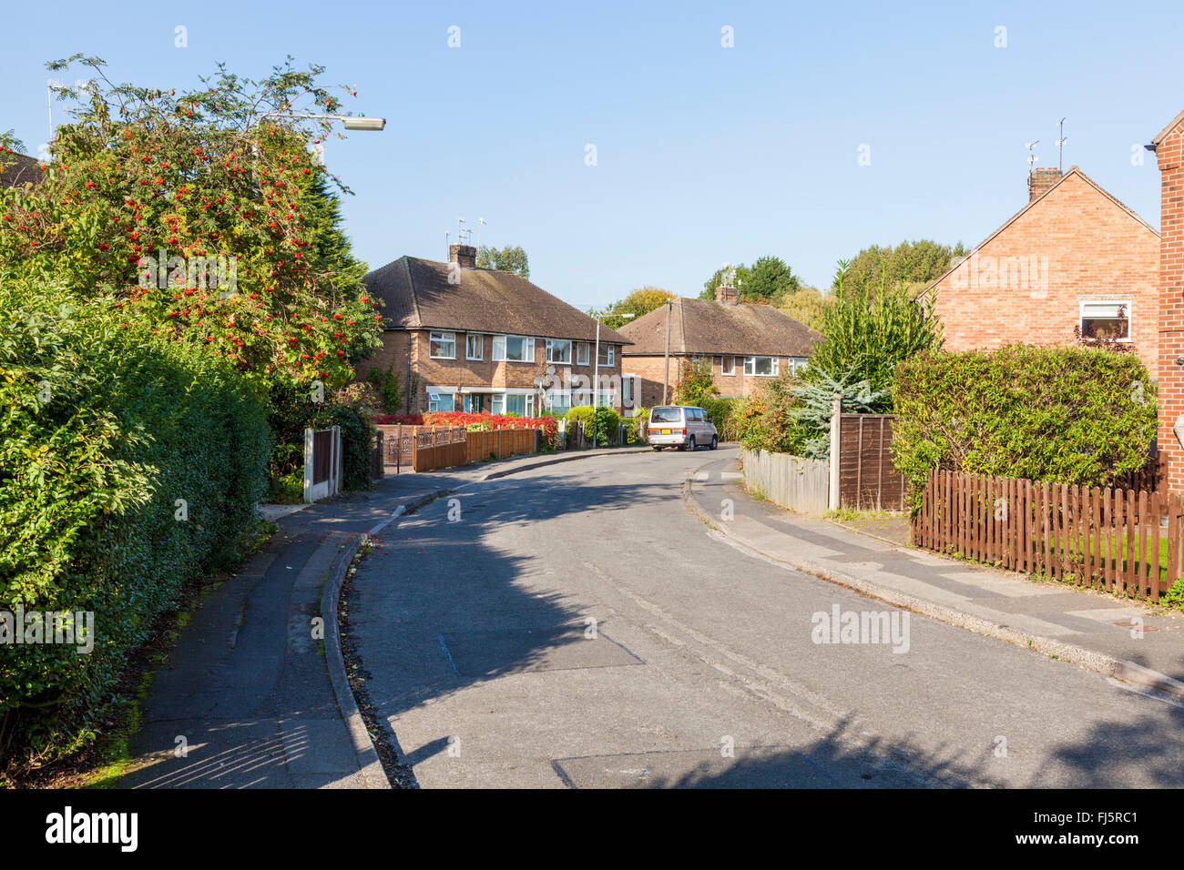 A crescent shaped road on a typical 1950s housing estate, Ruddington, Nottinghamshire, England, UK Stock Photo