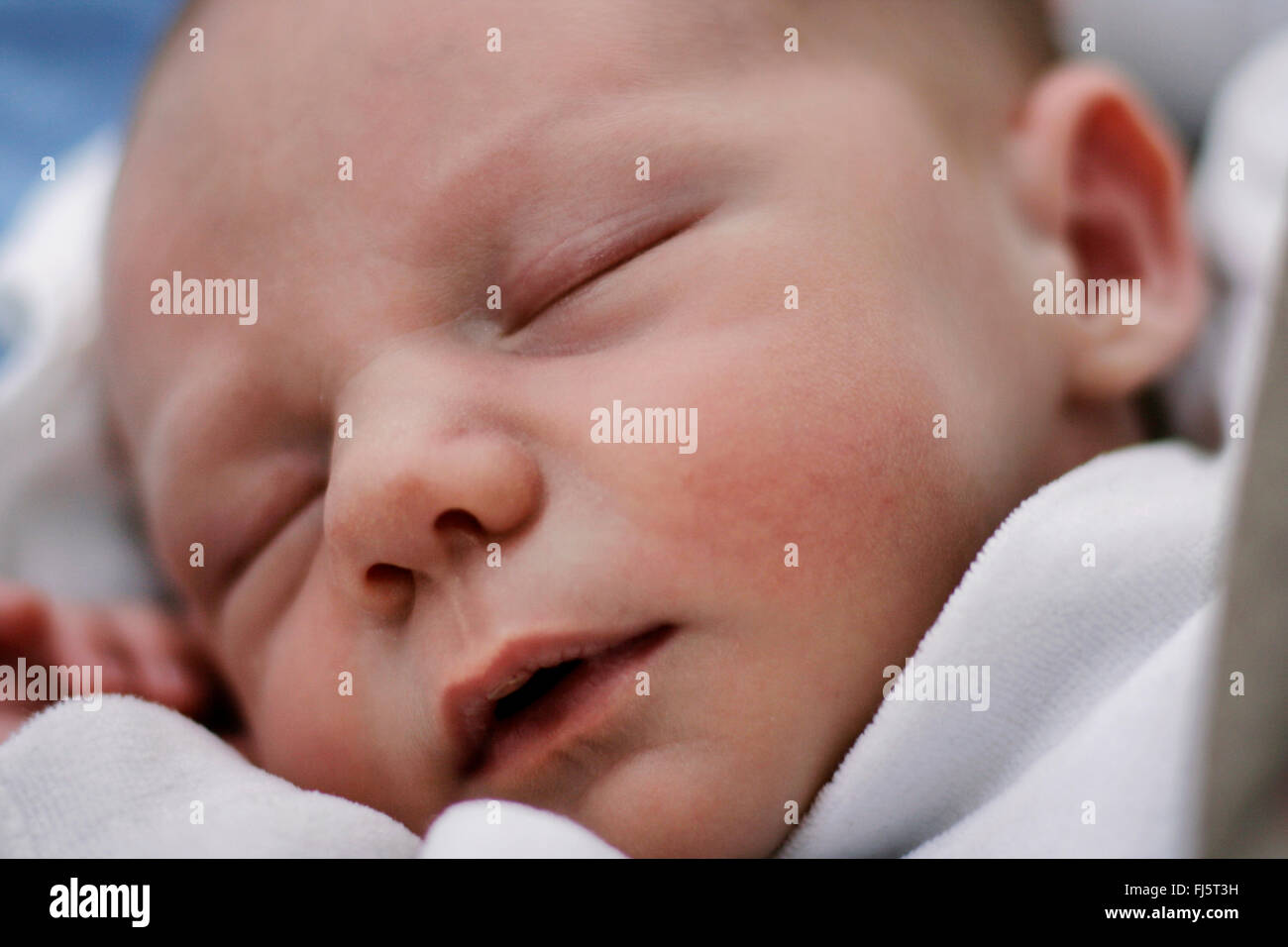 sleeping new baby, portrait of a child Stock Photo