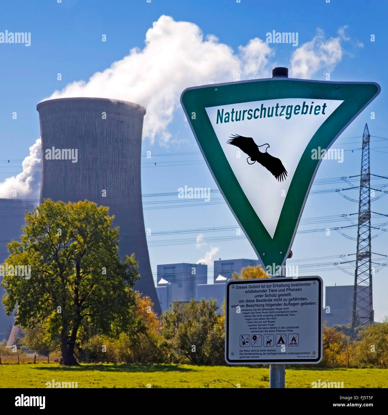 nature reserve sign in front of coal-fired power station Westfalen, RWE Power AG, Germany, North Rhine-Westphalia, Ruhr Area, Hamm Stock Photo