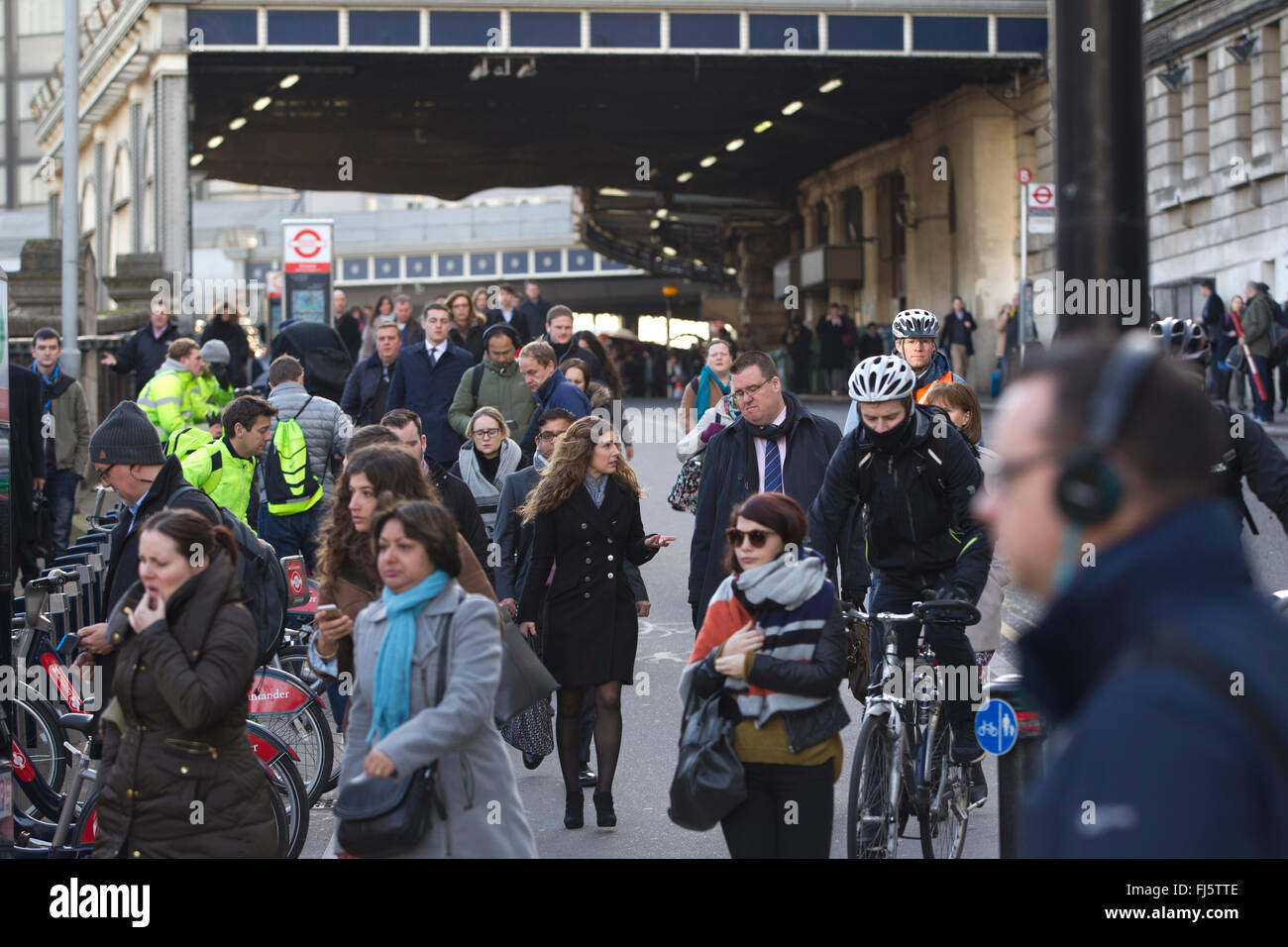 London Commuters heading into City of London after arriving at Waterloo Station, one of the main transport links to the Capital Stock Photo