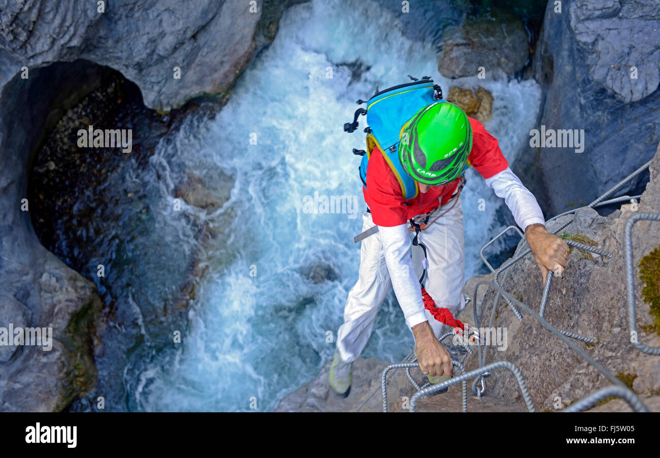 climber at Via ferrata of Chateau Queyras, France, Hautes Alpes Stock Photo