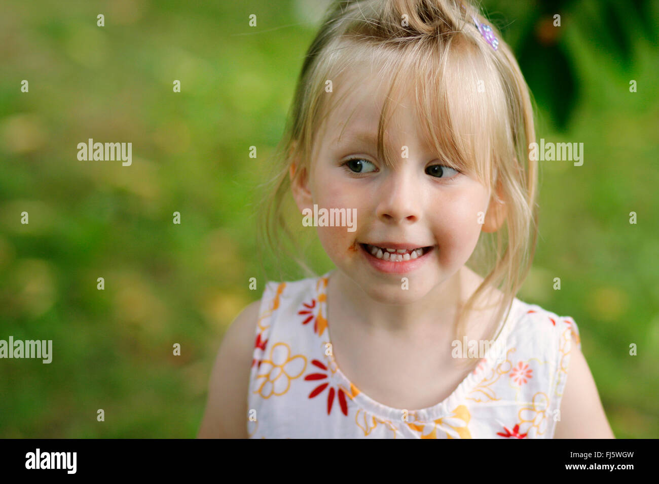 girl with chocolate mouth, Germany Stock Photo