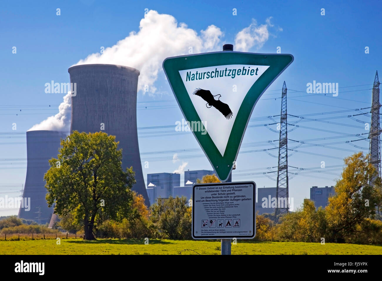 nature reserve sign in front of coal-fired power station Westfalen, RWE Power AG, Germany, North Rhine-Westphalia, Ruhr Area, Hamm Stock Photo