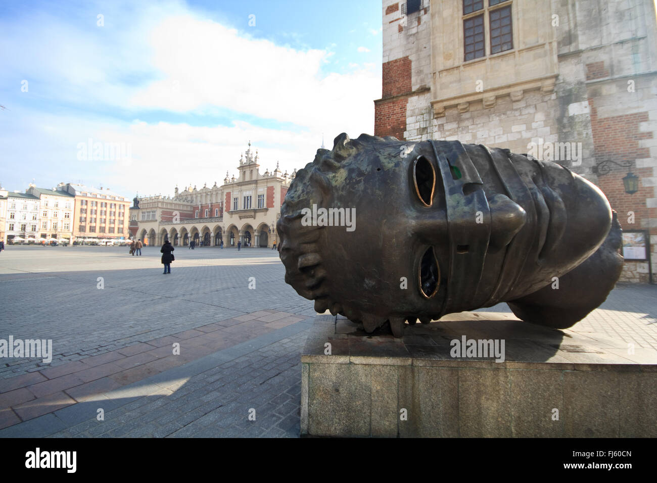 Famous statue in Krakow, popular "the head" sculpture on the main