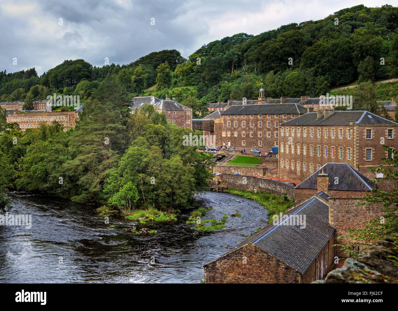New Lanark Mills by the River Clyde on a cloudy day Stock Photo