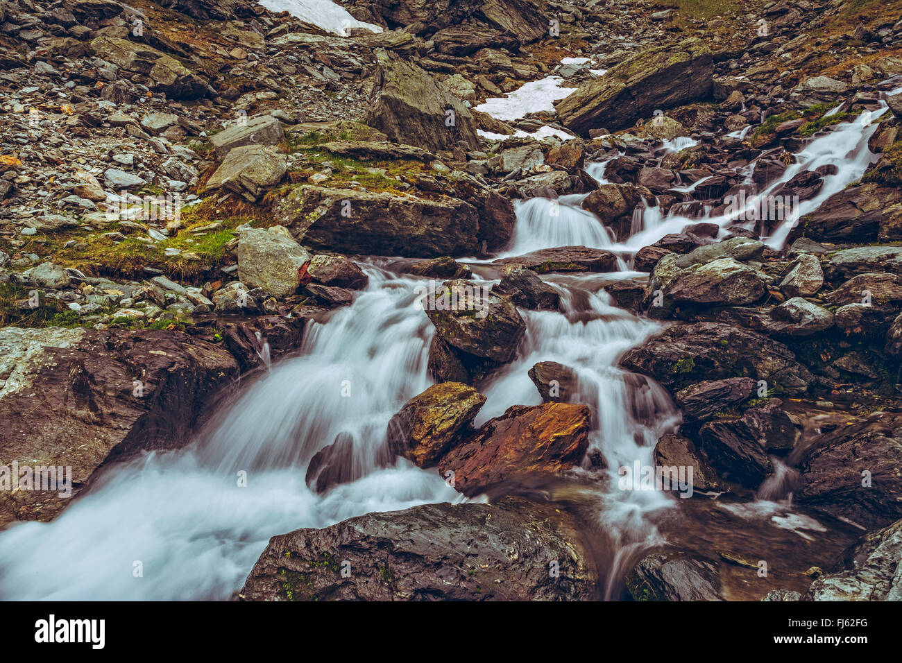 Swift mountain stream rapids flowing nearby the famous Transfagarasan