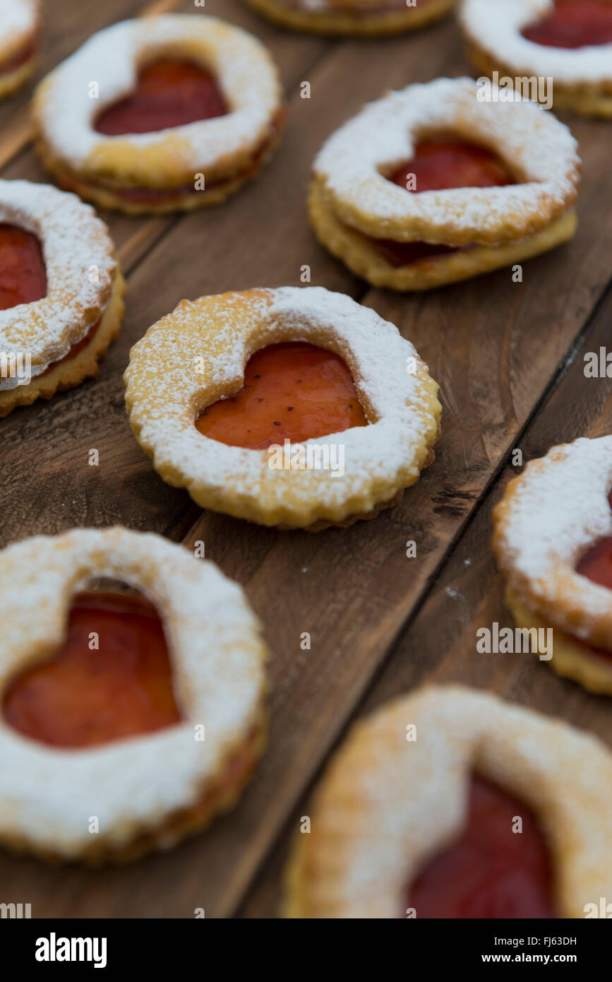 Jam sandwich biscuits (Linzer biscuits). Heart shaped jam biscuits