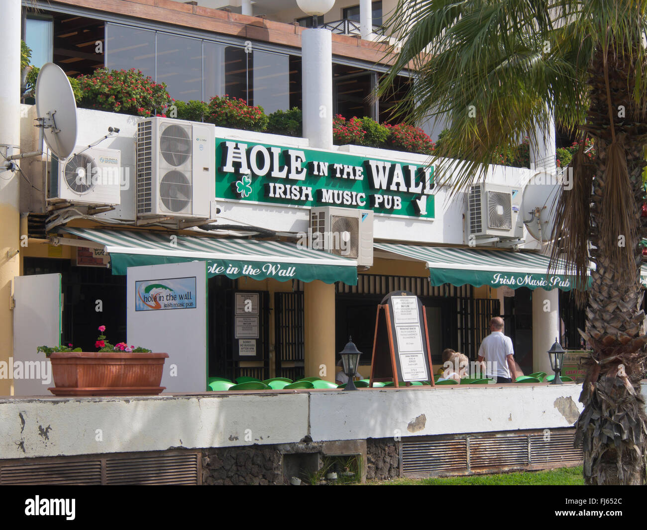 Hole in the Wall, Irish music pub in Playa las Americas Tenerife , Canary Islands Spain, refreshments and tourist entertainment Stock Photo