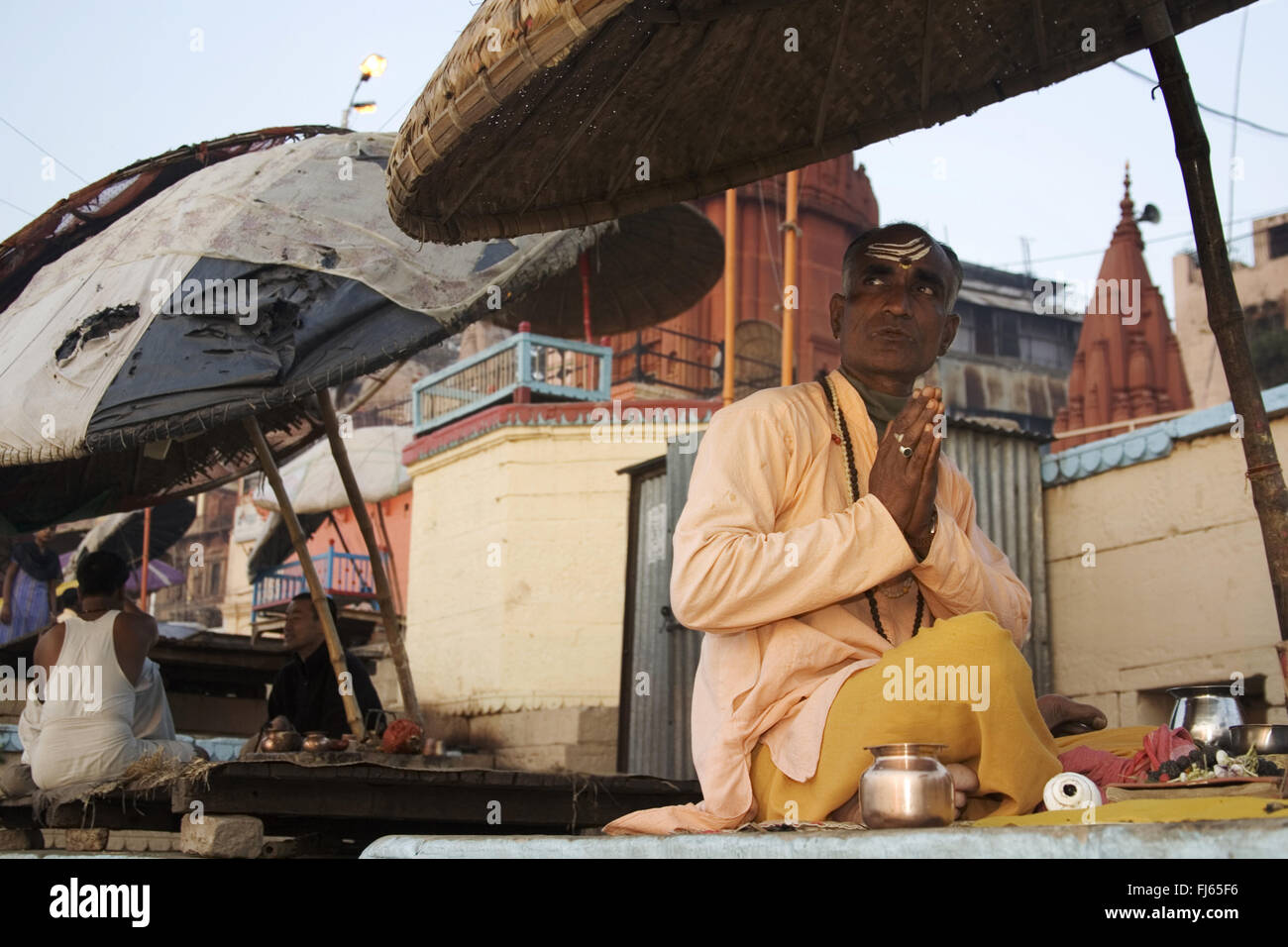 praying man, cross-legged, India, Varanasi Stock Photo