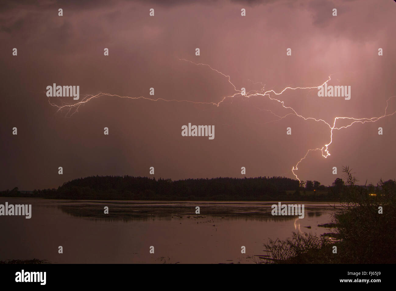 thunderstorm with lightning at the Chiemsee lakefront, Germany, Bavaria, Lake Chiemsee Stock Photo