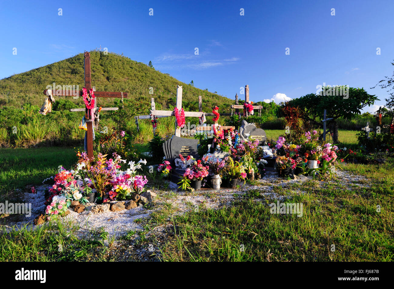 graveyard with decorated graves, New Caledonia, Ile des Pins Stock Photo